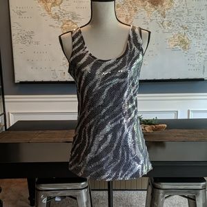 Sequins and animal print. Size medium. Cache